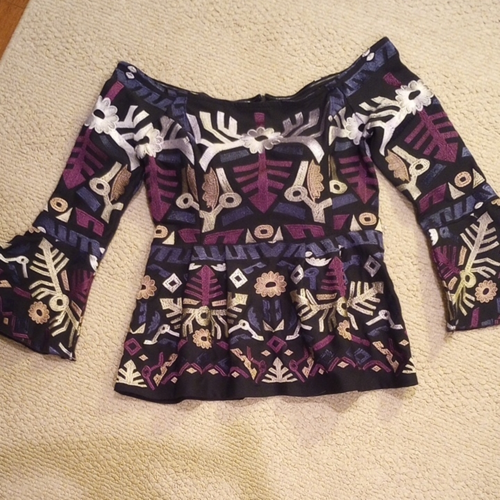 Venus Embroidered Wide Shoulder Peplum Top